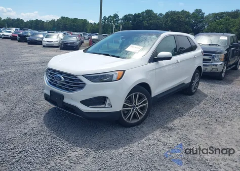 2022 Ford Edge Titanium z USA, uszkodzony, nr VIN 2FMPK4K90NBA13263